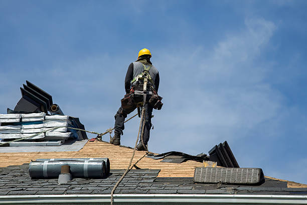 Professional Roof Replacement technician working in Longport, NJ